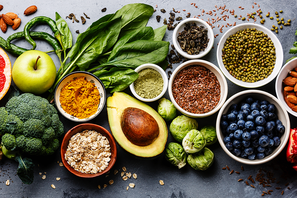 Healthy foods, fruits and vegetables laid out on a table