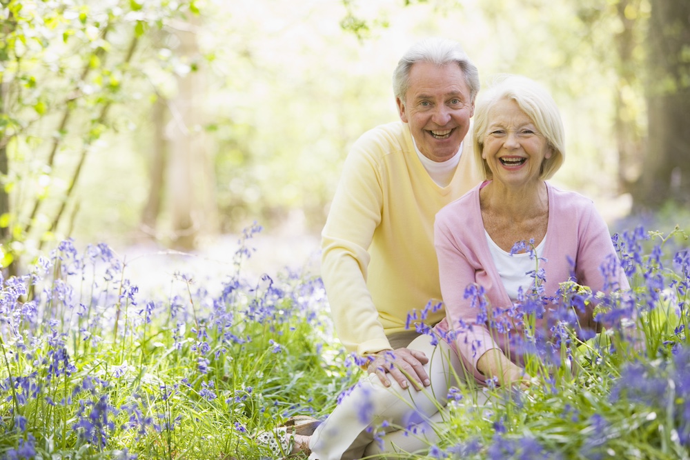 A senior couple enjoy a spring day at one of t best senior living communities in MI