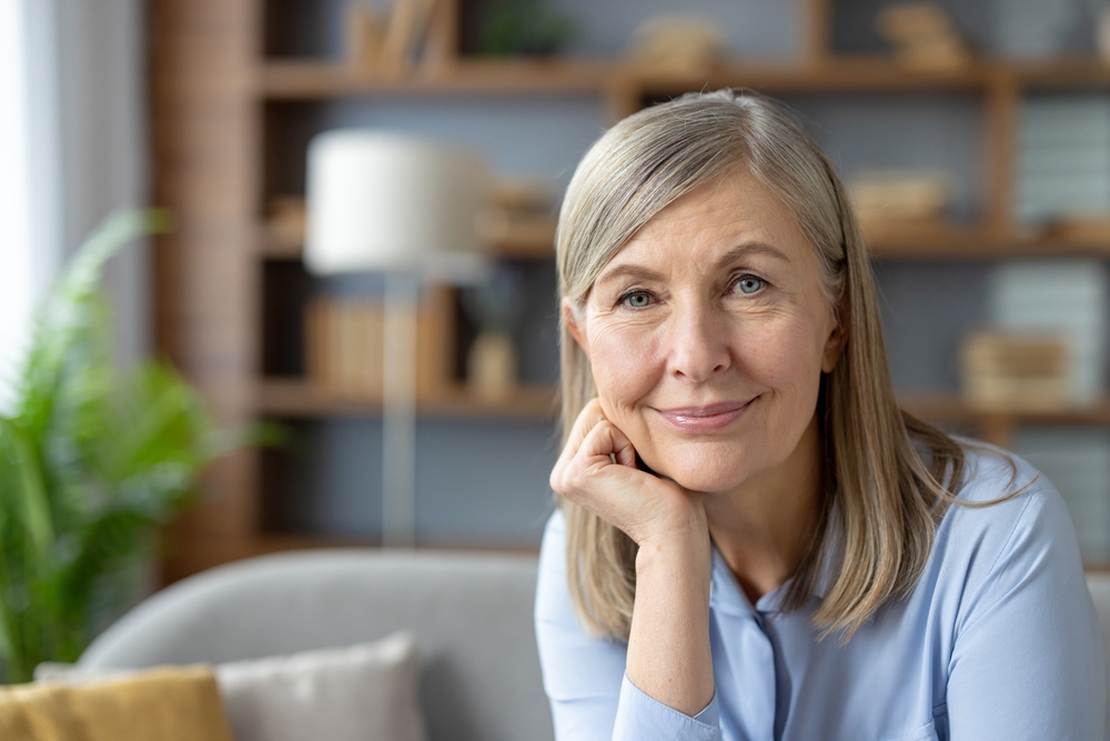 Woman smiling in dementia senior living.