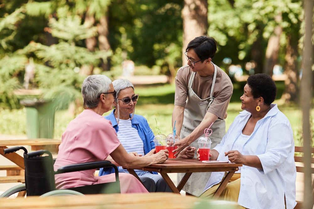 Group of senior women outside enjoying the perks of senior living canton mi 